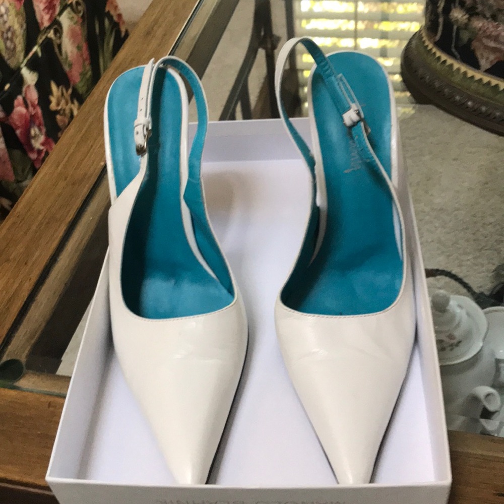 White sling back 5 inch heels.  Made in Brazil